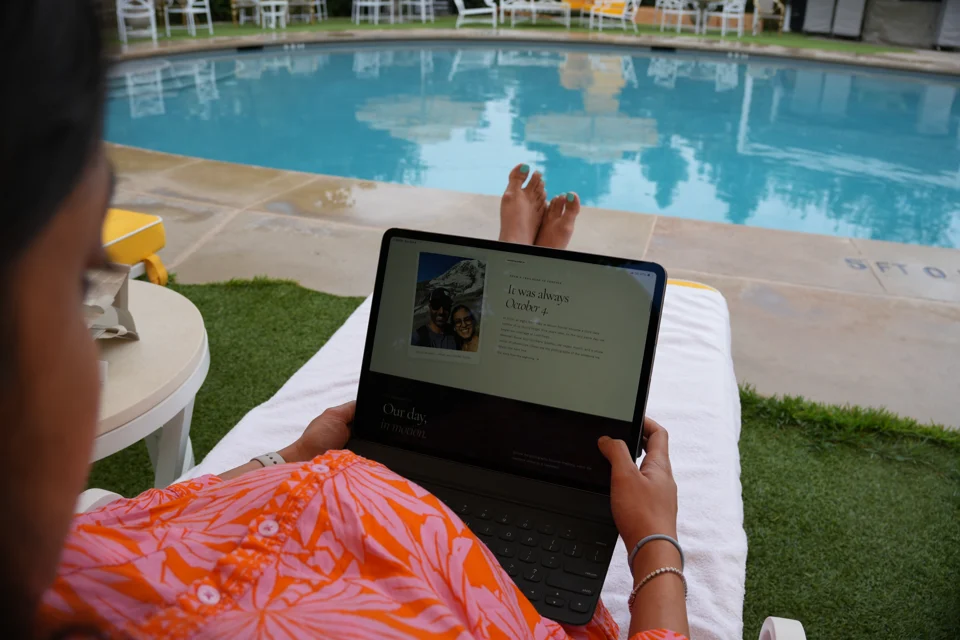 Relaxing with a tablet at the pool