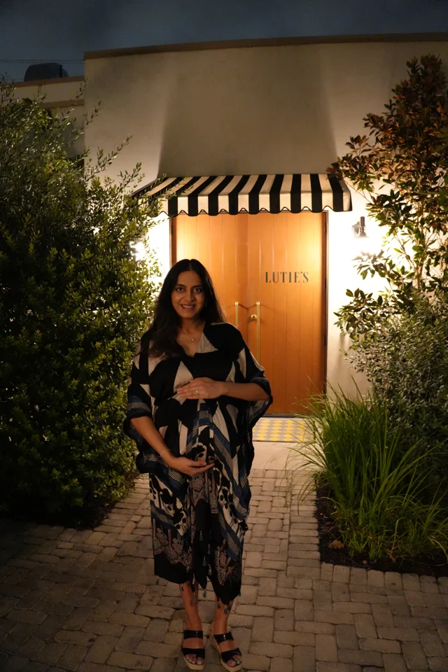 Mital outside the Lutie’s doorway
