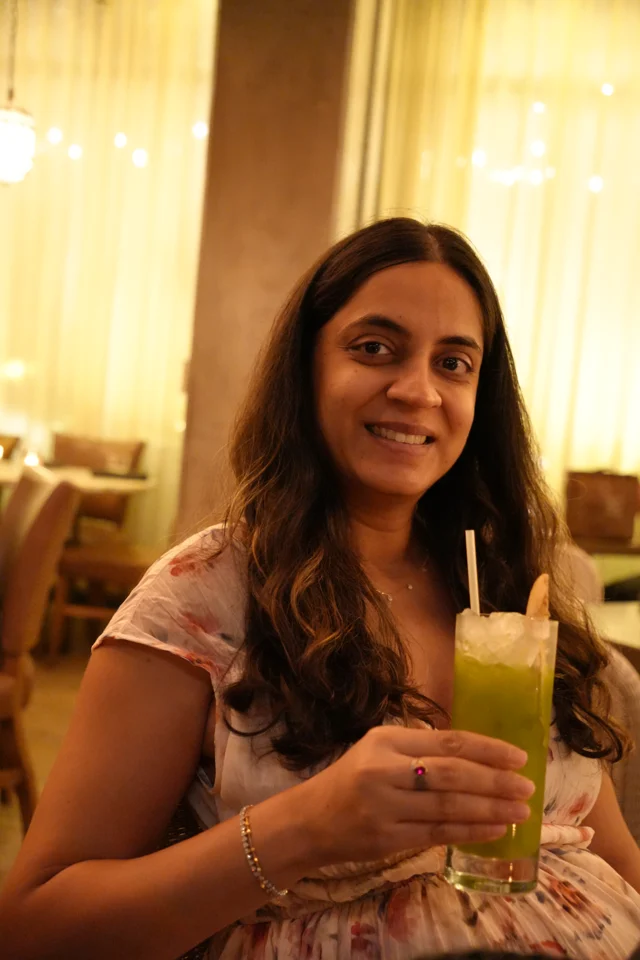 Mital with a drink at Aba