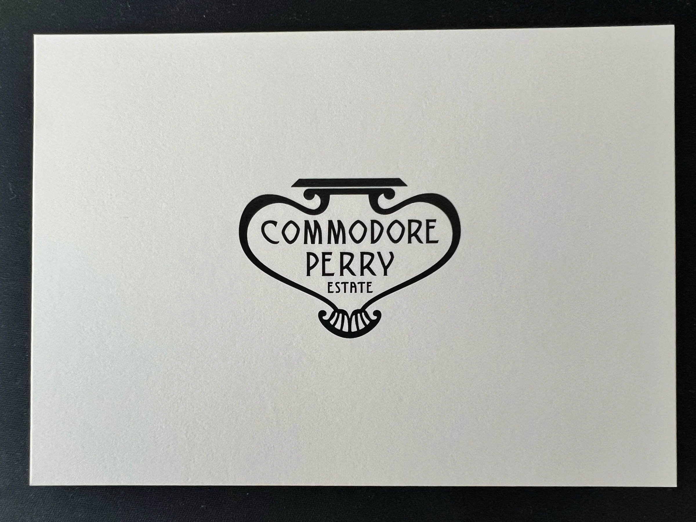 The back of the note, with the Commodore Perry Estate heart-shaped crest