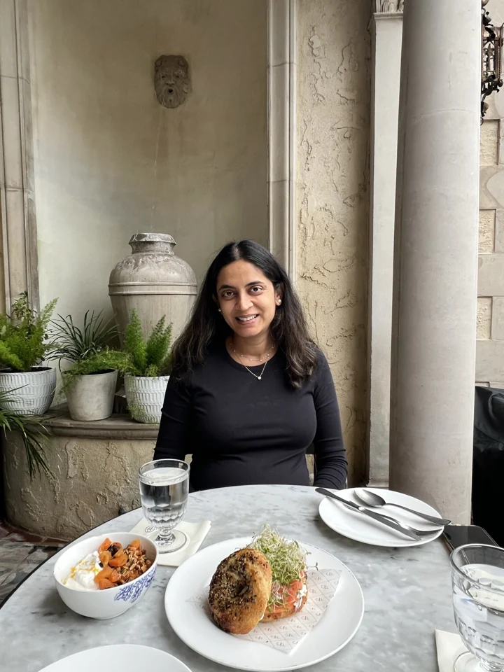 Mital enjoying a light meal on the mansion terrace after arriving